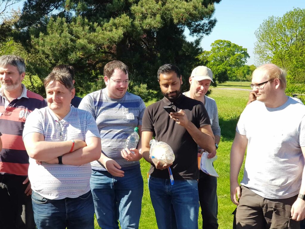 another group of men holding firework