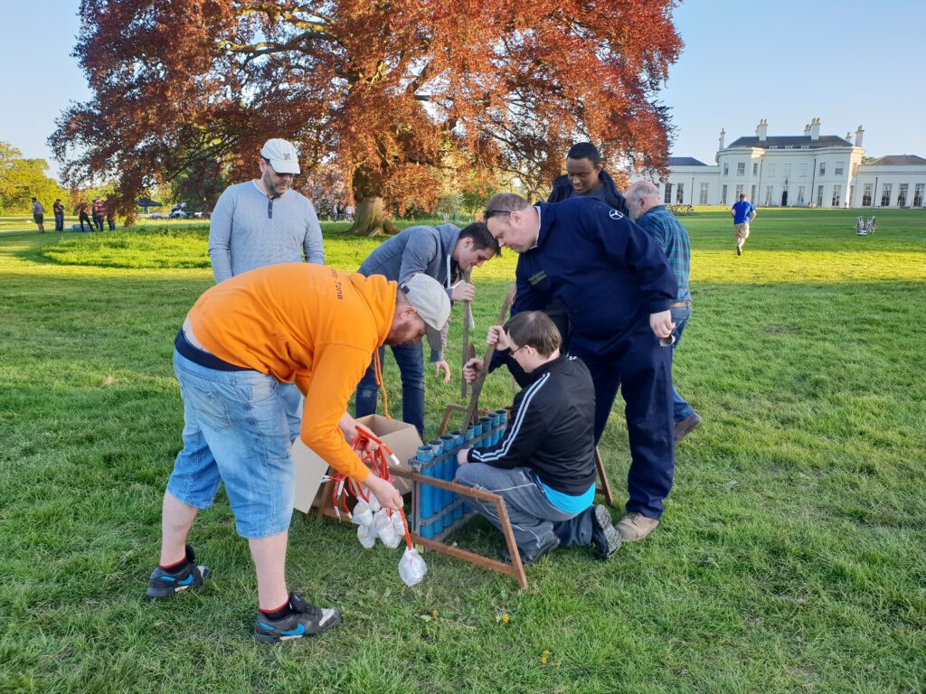 working together to set up the firework display