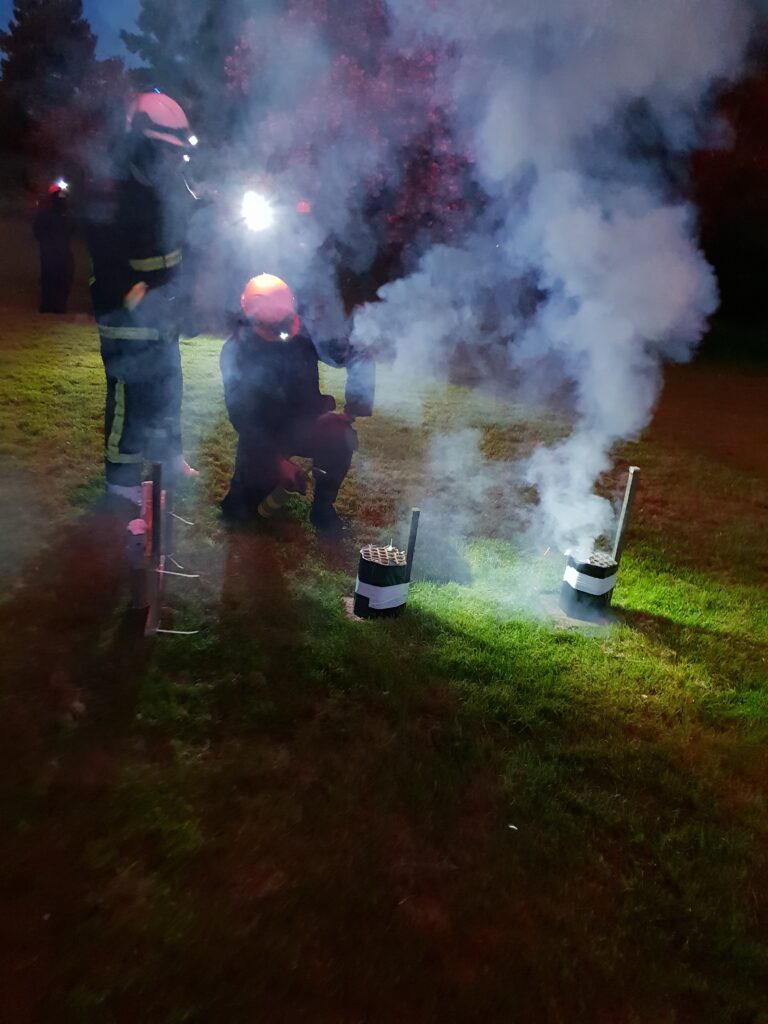 fireworks in a line being ignited